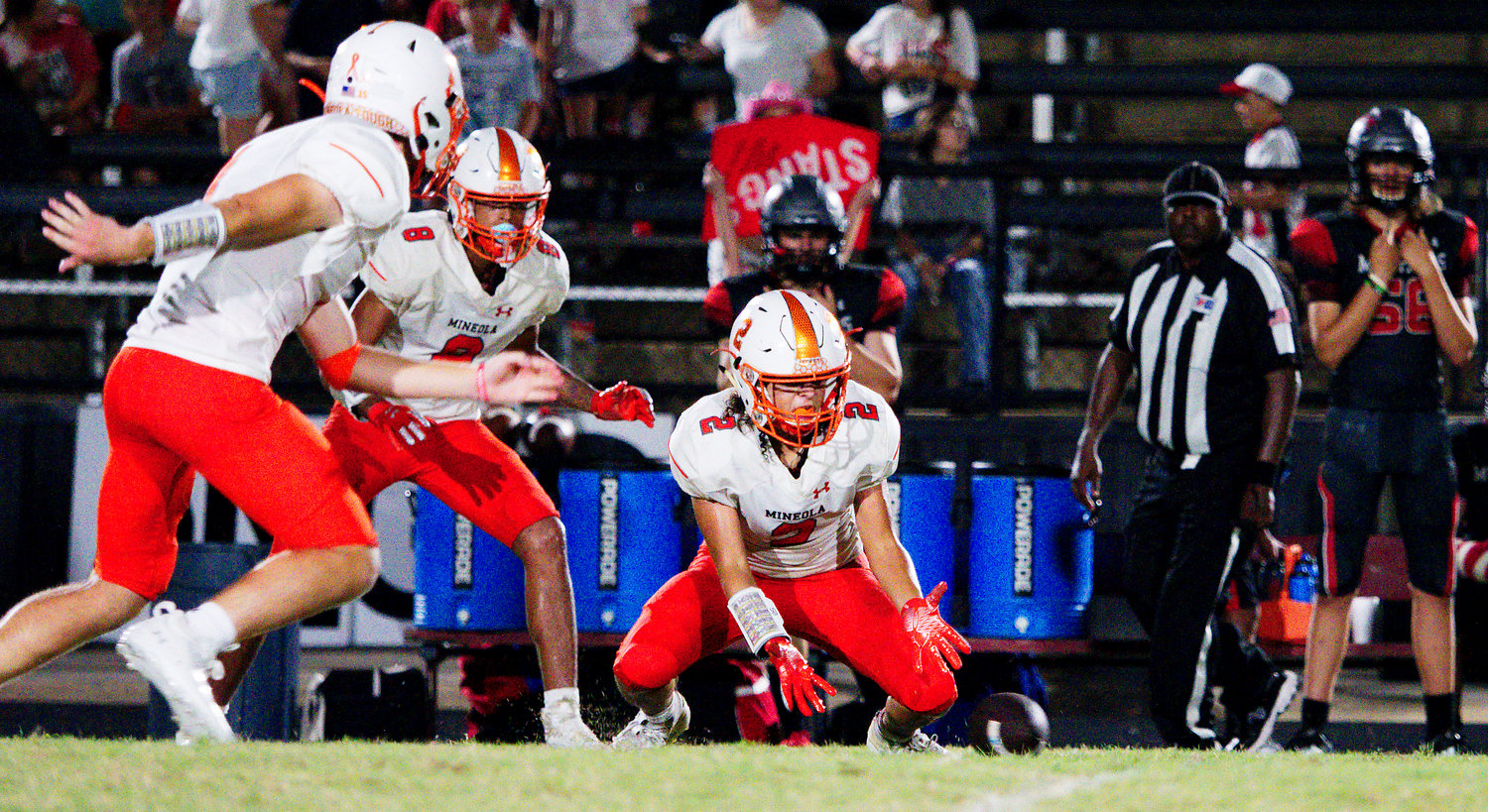 Mario Bautista sows good hands in recovering a Hughes Springs onside kick attempt agaiknst Mineola Friday night.